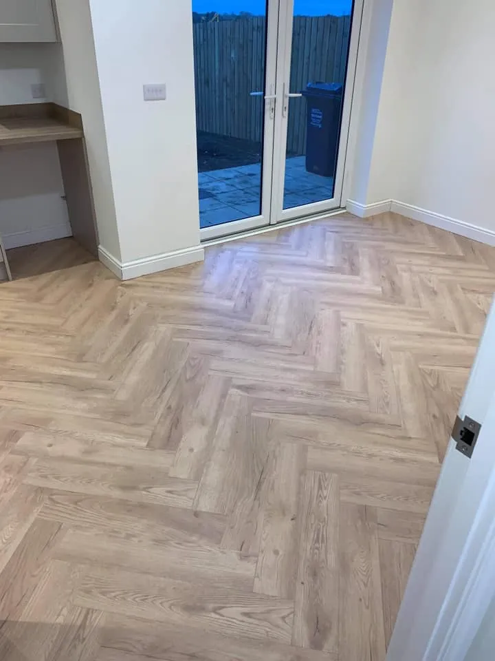 wooden flooing with patio doors